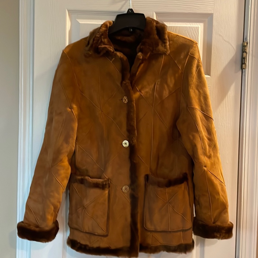 Beautiful suede/fur jacket can be reversible very classic,turn up cuffs for fur